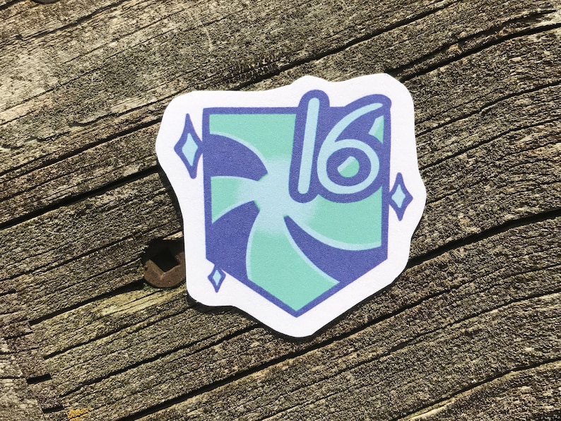 May include: A teal blue and purple sticker with a swirl design and the number 16 in the centre. The sticker has two white diamond shapes on either side of the number.