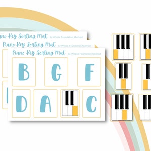 May include: A set of piano key sorting mats with the text "Piano Key Sorting Mat" and the letters B, G, F, D, A, and C in light blue. The mats also feature illustrations of piano keys with yellow highlights. The background includes a rainbow design.