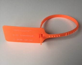 converse with orange tag