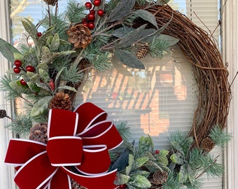 Christmas grapevine wreath, red velvet ribbon, lamb’s ear, pine cones