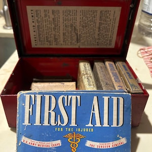 World War II First Aid Kit & Booklet Complete W/ Supplies, Gauze Bandages, Ammonia Ampules Empty Petrolatum Box, Functional Lock