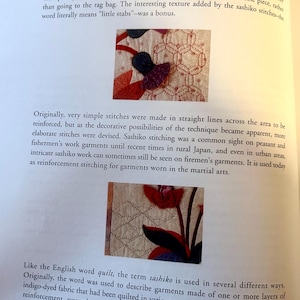 May include: Open book page with the title "Sashiko: Decorative Quilting." The page features text and images of Sashiko stitching, a traditional Japanese folkcraft used for mending and reinforcement of fabrics. The text describes the history and techniques of Sashiko.