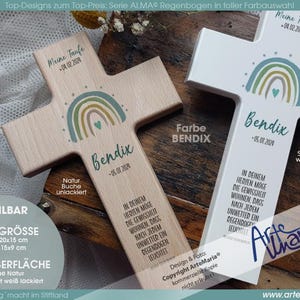 Könnte beinhalten: Zwei Holzkreuze, eines naturfarben und eines weiß, mit Regenbogen-Design und dem Namen "Bendix" und einem Datum. Text enthält "Meine Taufe" und "In deinem Herzen möge die Gewissheit wohnen, dass nach jedem Unwetter ein Regenbogen leuchtet."