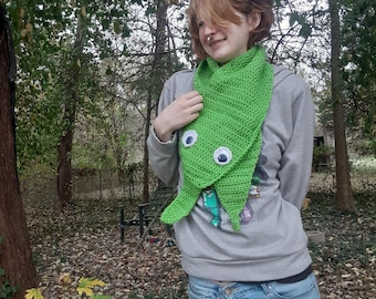 Crochet worm on a string scarf with googly eyes.