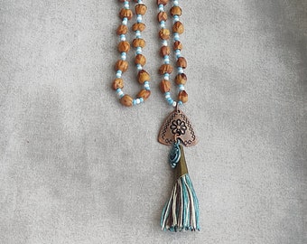 Long Blue Brown and White Nut Beaded Tassel Necklace with Charm