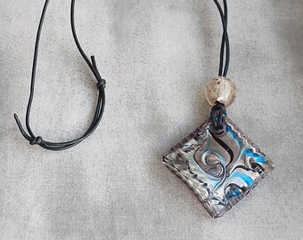 Glass Silver Blue and Black Resin Swirl Pendant With Adjustable Cord