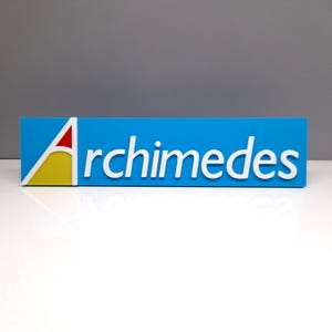 May include: A rectangular sign with the word "Archimedes" in white, set against a bright blue background. The logo features a white triangle with red and yellow accents. The sign is on a white surface.
