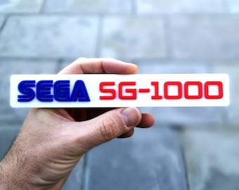 Imán 3D para nevera o estantería de Sega SG-1000: logotipo de videojuegos retro de 8 bits de los 80