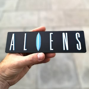 Außerirdischer Kühlschrankmagnet / Regalaufsteller - Classic Movie Logo