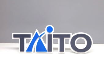 Taito fridge magnet / shelf display - Video Games Logo