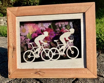 Cycling art made with dried flowers