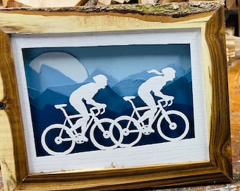 Gravel bike couple.  This can be a gravel bike or road bike group riding the mountains. Last day for Christmas orders 11/31/24