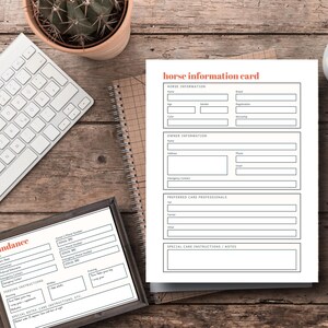 May include: A wooden desk displays a white keyboard, a framed horse care sheet, a notepad, and a horse information card. The horse information card has the text "horse information card" in orange. The framed sheet has the name "Sundance" in orange.
