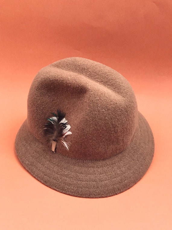 tan bowler hat
