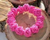 Polymer clay bracelet, hand-molded, "Gomitolini" collection by Clayart, fuchsia colour.