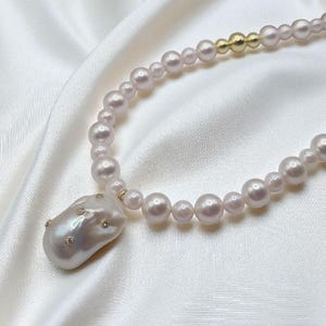 Freshwater pearl necklace with baroque pearl and zirconia in 925 sterling silver gold-plated toggle clasp