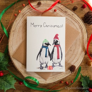 Frohe Weihnachten | Weihnachts Pinguin Paar | Mütze und Schal | A6 Blanko-Karte | Weihnachtskarte | Pinguine