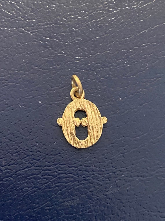 O initial charm