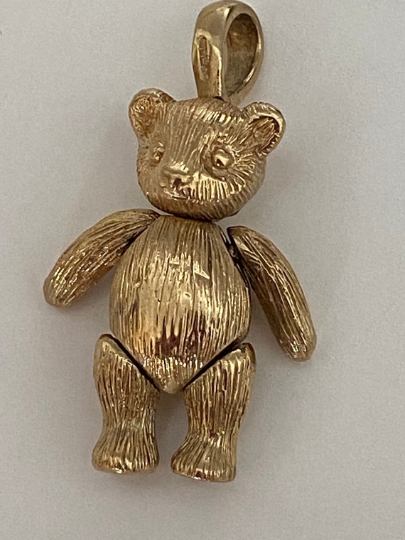 Moveable gold teddy pendant