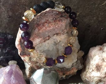 Soul’s Journey, Amethyst, Rutilated Quartz (Venus Hair) and Lava Bead Bracelet. 8mm  Energy Bracelet by Journey Stones.