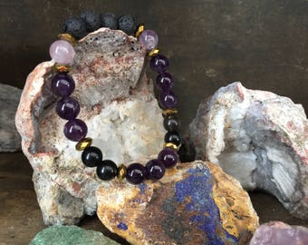 Amethist, Auraliet 23, obsidiaan en lava kralenarmband. Armband. Energiearmband van Journey Stones. Wijsheid | Macht | Godin | Nutuur