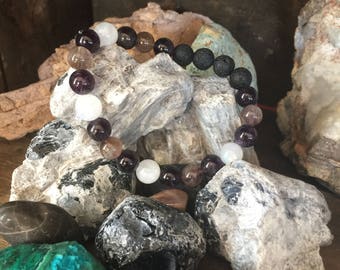 Moonstone, Amethyst, Rare Auralite 23 Cacoxenite and Lava.  Aurora Dawn| Stability | Guidance AAA 8mm Energy Bracelet by Journey Stones