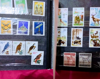Vintage postal stamps album MNH