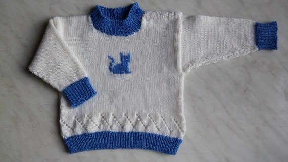 white knitted cardigan baby boy
