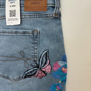 Women's slim jeans elegant , pearls, butterfly, sticky flower, sexy