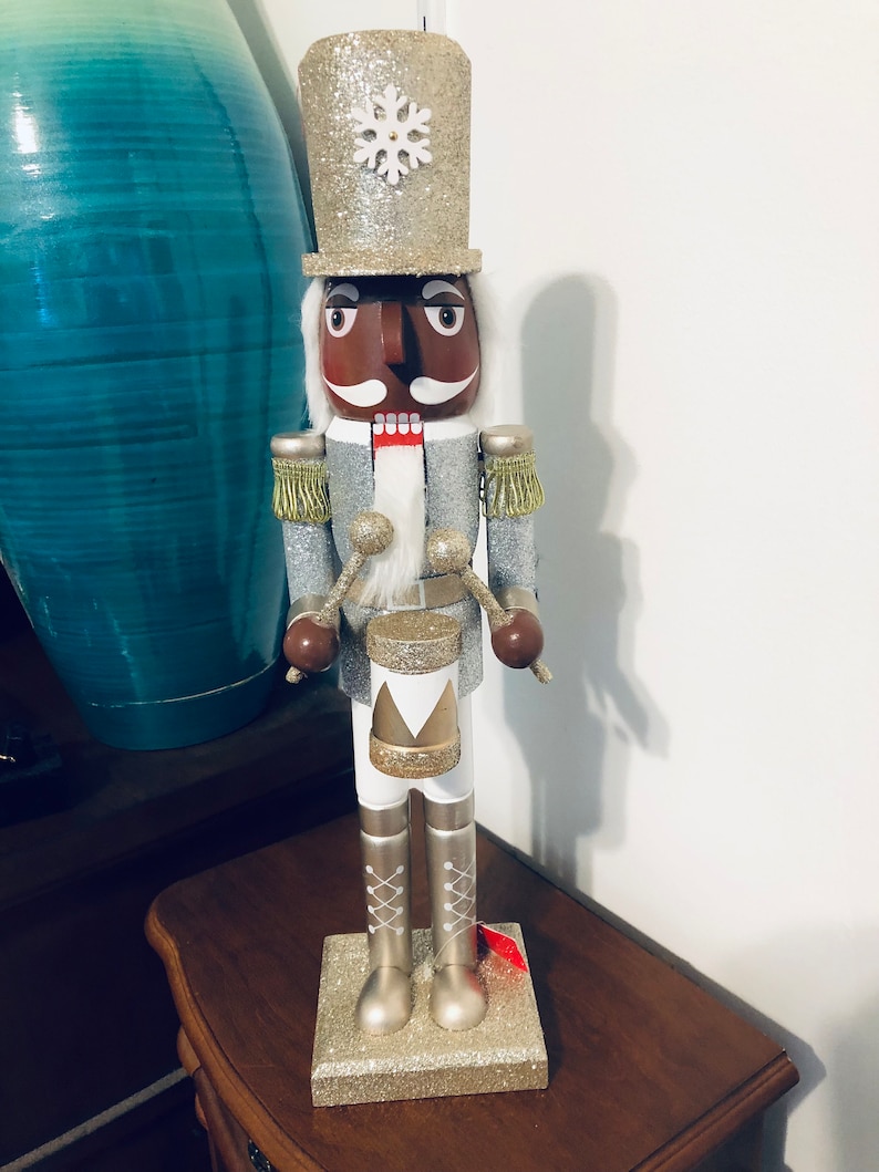 African American Nutcracker Adorned With Silver and Gold. 18 Inches