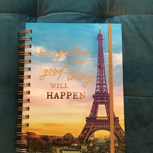 Lovely Large Paris Eiffel Tower Journal. Spiral back. 9 inches long. 61/2 inches wide. Lovely gift or keepsake.