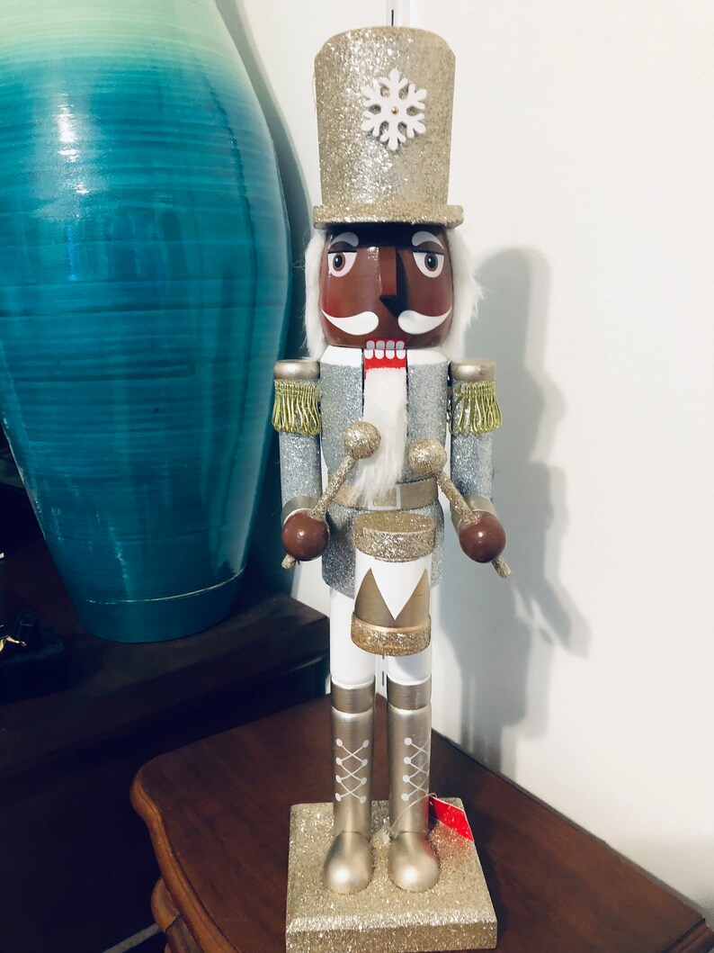 African American Nutcracker Adorned With Silver and Gold. 18 Inches