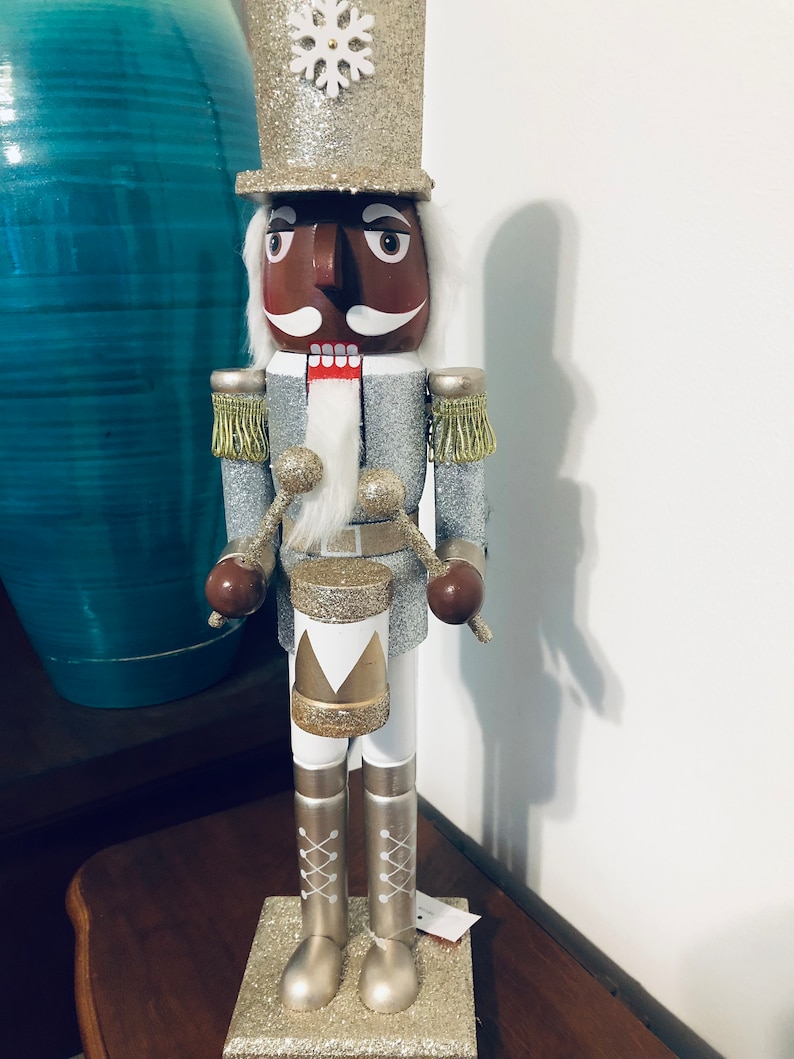 African American Nutcracker Adorned With Silver and Gold. 18 Inches