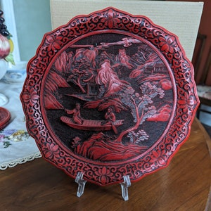 Cinnabar plate with scalloped edge
