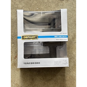 May include: A Defiant Tonebridge matte black finish door lever set for bed and bath. The packaging includes the brand name, product type, and features. The lever is reversible and fits right or left hand doors.