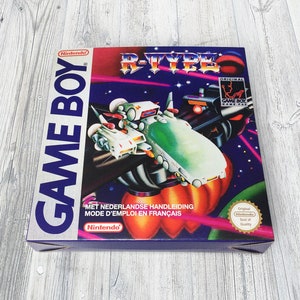 May include: A retro Nintendo Game Boy game box for "R-Type." The box displays a colourful space scene with a spaceship and the game title. The box includes text in Dutch and French, along with the Nintendo and Game Boy logos.