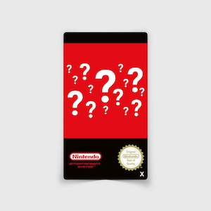 Peut inclure: Une cartouche de jeu rectangulaire Nintendo Entertainment System avec un fond rouge et des points d'interrogation blancs. La section inférieure est noire avec le logo Nintendo et un sceau doré. Un article de jeu rétro.