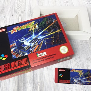 May include: A red Super Nintendo game box featuring a blue and white illustration of a futuristic vehicle. The game is titled "R-Type III" and is licensed by Nintendo. The box includes a Dutch, French, and English instruction manual.