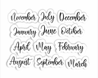 May include: A collection of twelve white stickers, each featuring a month of the year in elegant black cursive script. The months include November, July, December, January, June, October, April, May, February, August, September, and March.