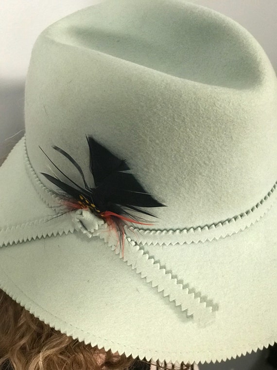 green felt cowboy hat