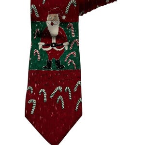 Save The Children Lauren, 11 ans, Cravate fantaisie vintage Père Noël en canne de bonbon