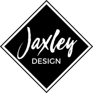 May include: A black and white logo featuring the name "Jaxley" in a cursive font, with "DESIGN" in a sans-serif font below. The logo is set within a black diamond shape with a white border.
