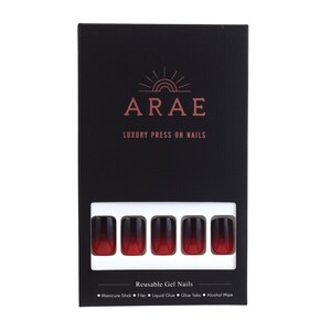 Squoval shaped nails in an ombre design. The tips are black and move to a cherry red at the base. The nails are a rounded square. They come in a Black box. The box includes a Manicure stick, Nail file, Liquid Glue and Glue Tabs and an alcohol wipe.