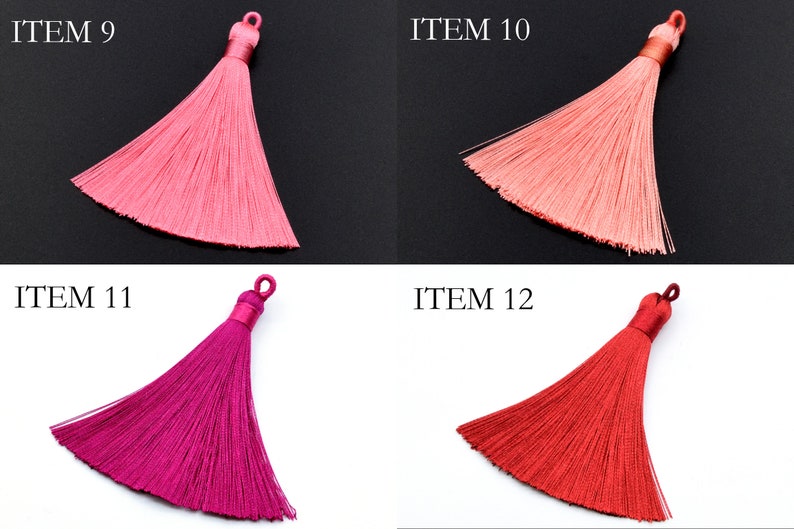 May include: Four silk tassels in different colors: pink, light pink, fuchsia, and red. The tassels are all the same size and shape, and they are hanging from a white background. The tassels are labeled "ITEM 9", "ITEM 10", "ITEM 11", and "ITEM 12".