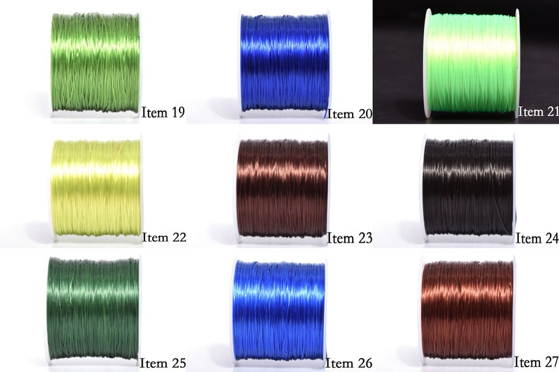 May include: Collection of spools of colorful beading thread. Colors include green, blue, and brown. Each spool is labeled with an item number. Ideal for jewelry making and crafting projects.