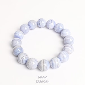May include: A bracelet made of round, light blue agate beads. Each bead is approximately 14mm in diameter and features a unique pattern of white and gray swirls. The bracelet is displayed on a white background.