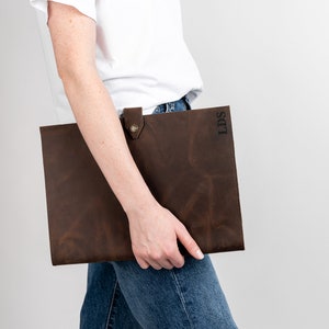This Leather portfolio can be carried around easily. It's a soft leather and carry your notepad, business cards and more