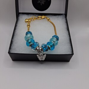 Pulsera de mariposa azul