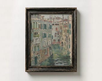 May include: An oil painting in a dark, distressed wooden frame depicting a canal scene with multi-story buildings in shades of grey, blue, and tan. The artwork features visible brushstrokes, a water reflection, and the date 1888 in the corner.
