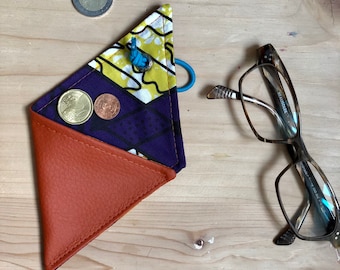 Coin purse and coin purse in orange vegan leather and wax print cotton interior